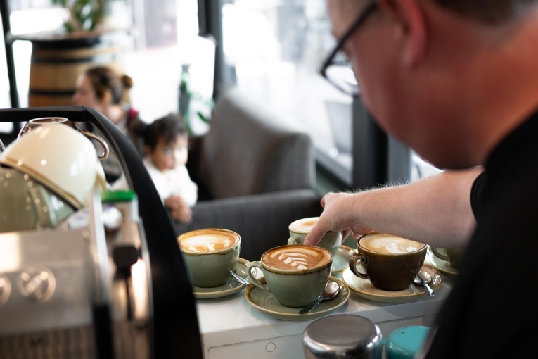 Four coffees poured and ready to be served to customers at Soul Brew Coffee