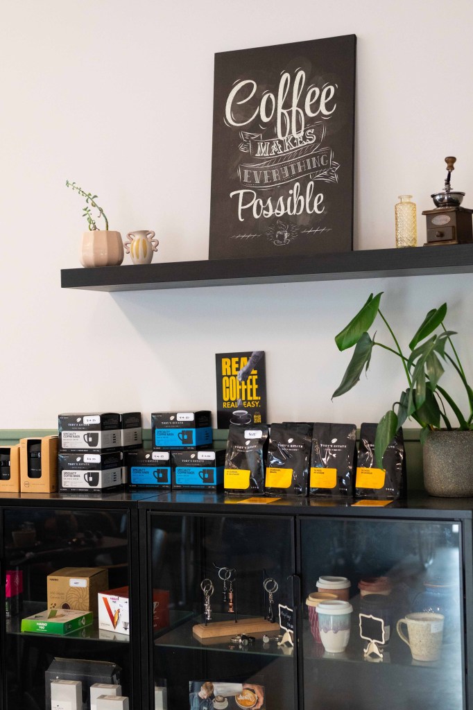 Shelves with packages of take home coffee beans at Soul Brew Coffee 