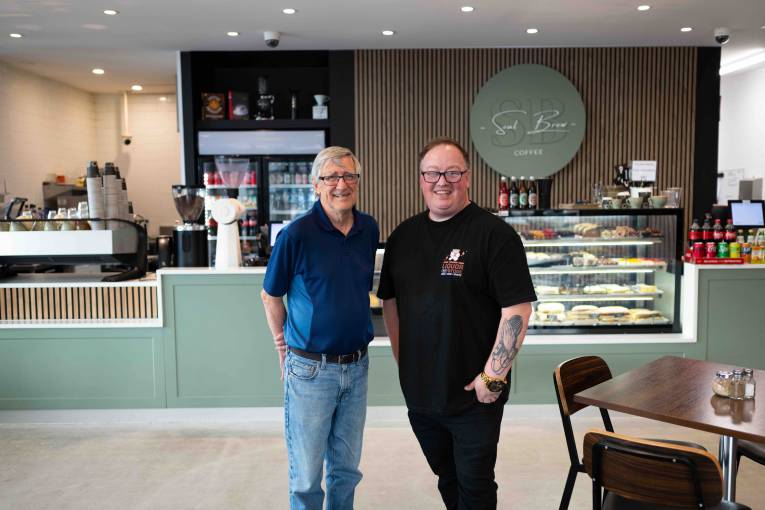 Paul and Shallum, the owners of Soul Brew Coffee standing in the cafe