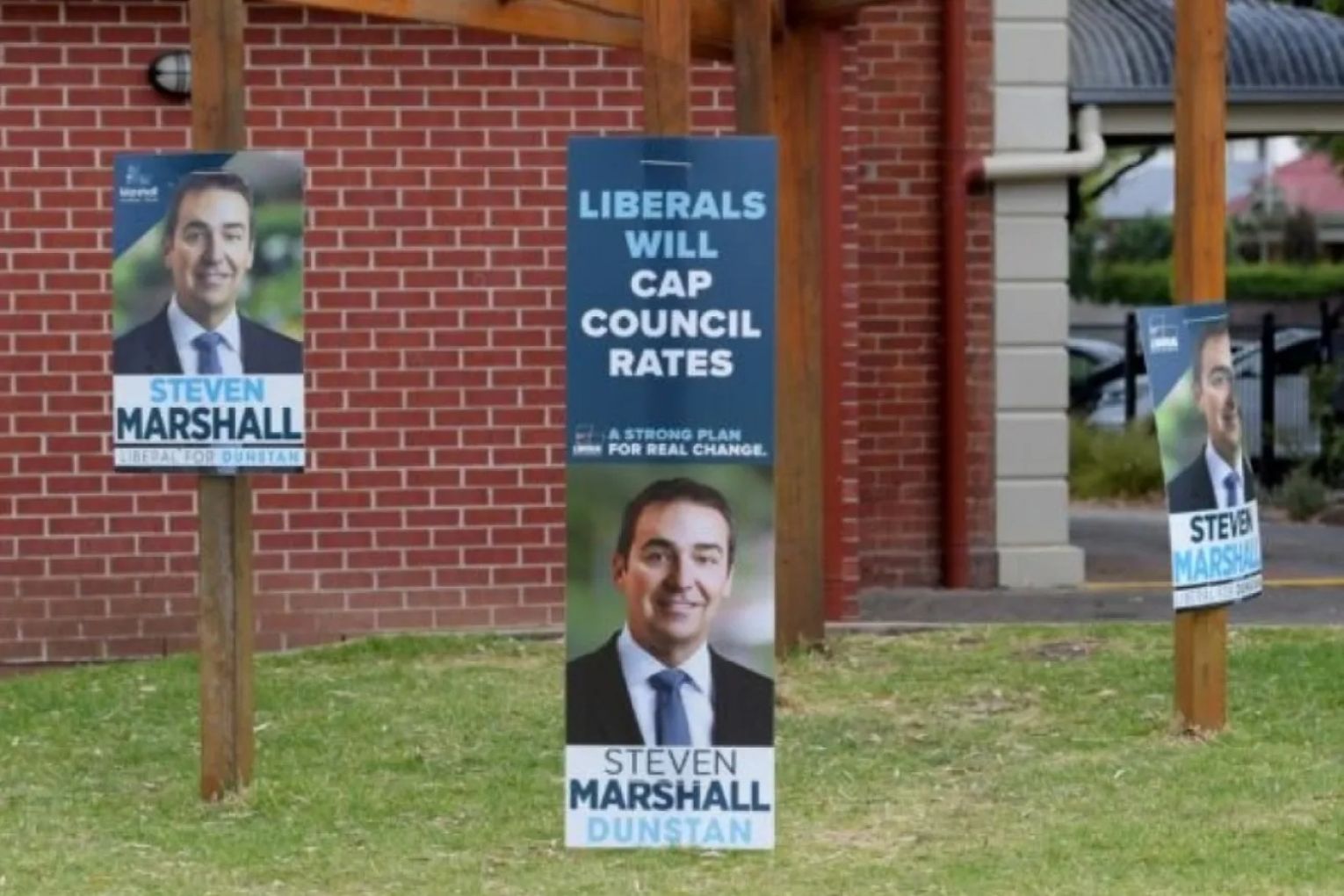 Former premier Steven Marshall's campaign posters on election day, 2018. Photo: Tracey Nearmy/AAP