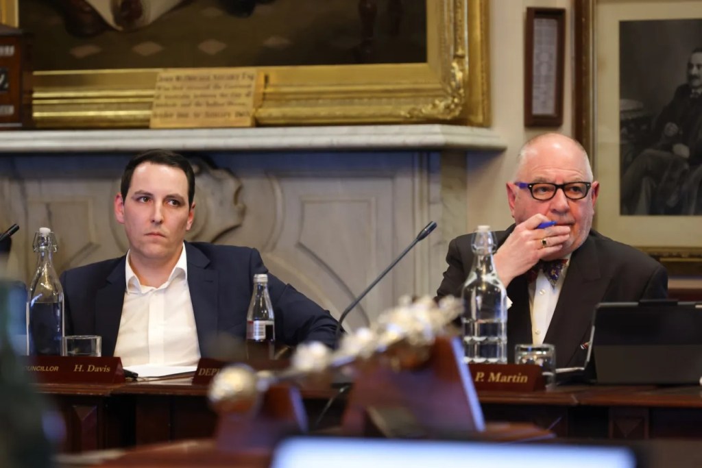 Councillor Henry Davis (left) says he will sue councillor Phillip Martin (right) and councillor Janet Giles for defamation over comments made at a July meeting. Photo: Tony Lewis/InDaily