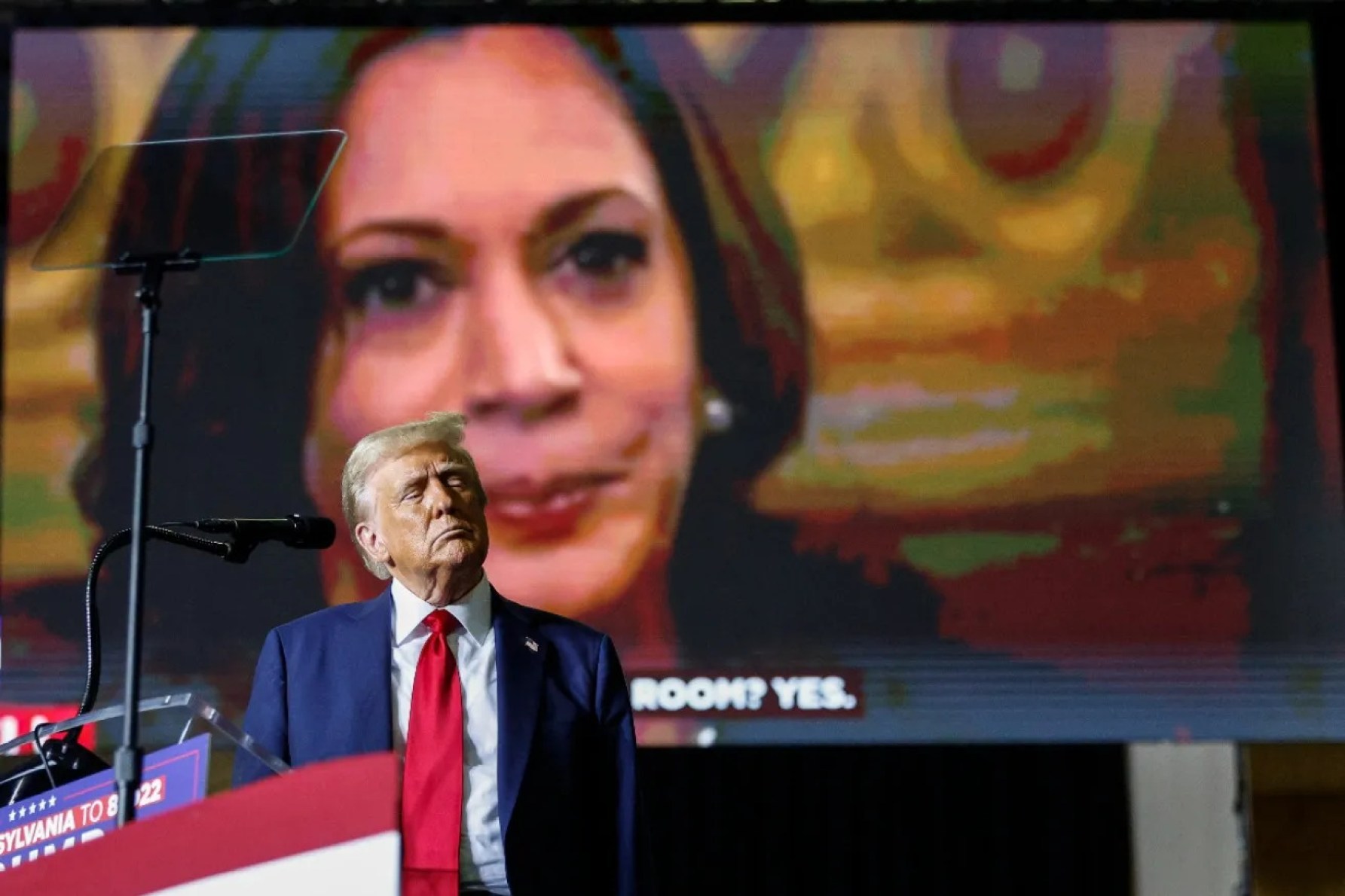 Donald Trump plays a video of rival Kamala Harris during a campaign rally in Pennsylvania. Photo: AP/Pennsylvania Inquirer