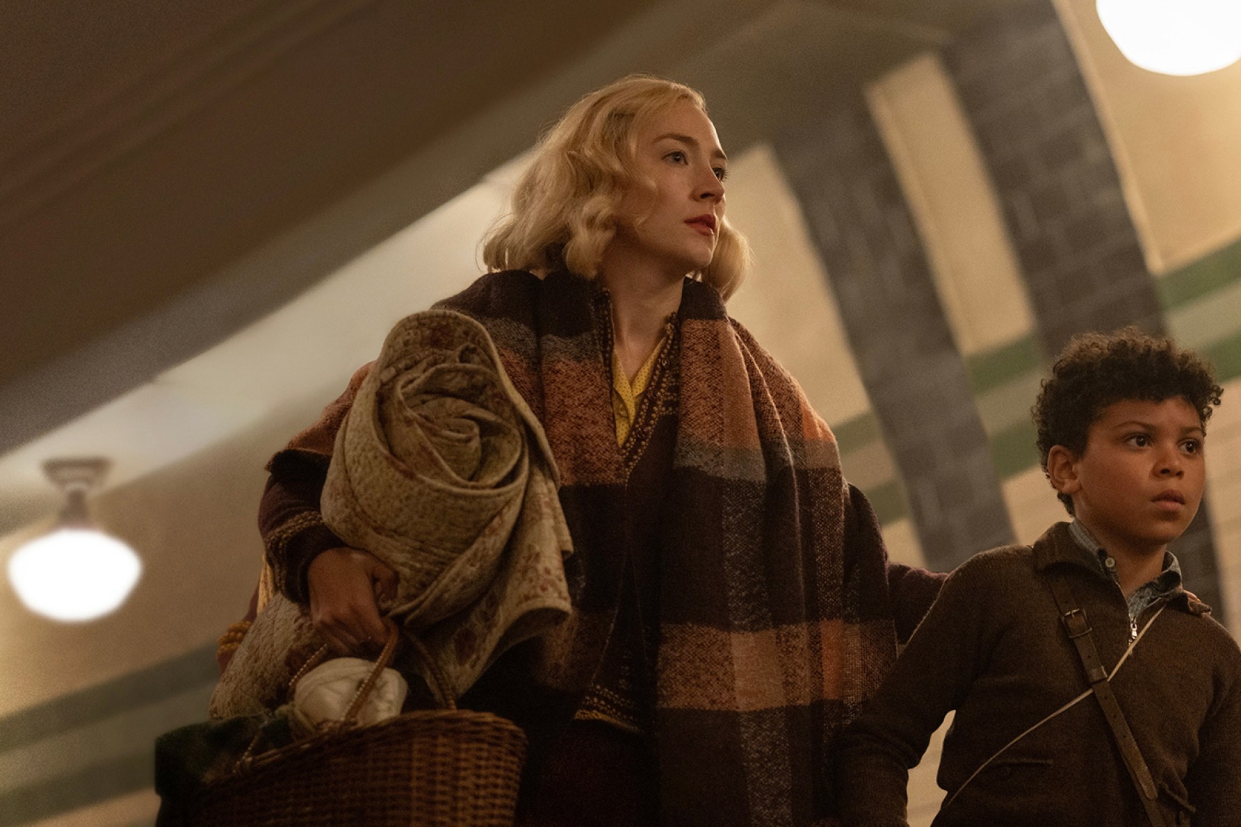 Saoirse Ronan and Elliott Heffernan in director Steve McQueen's World War II drama 'Blitz'. Photo supplied