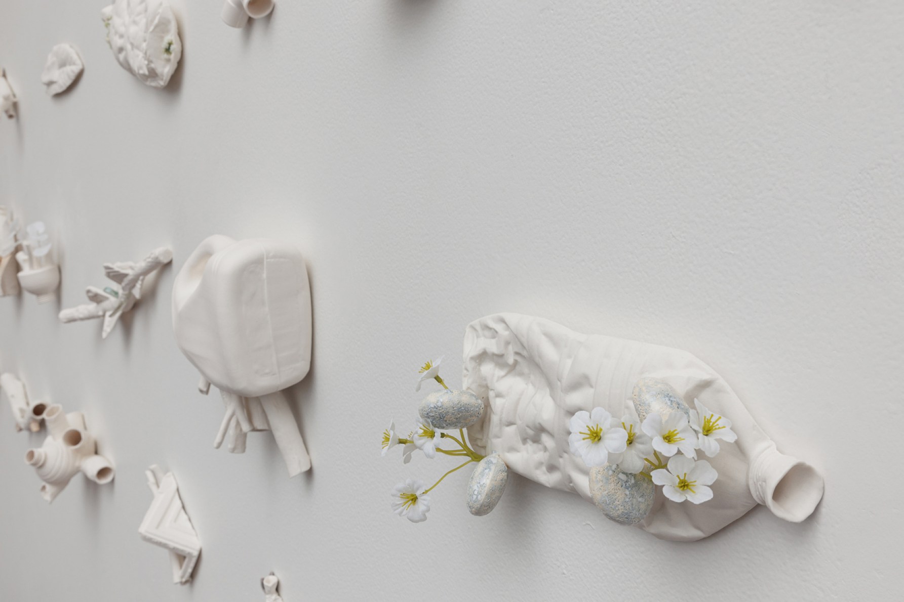 Lauren Downton, 'Amalgam' (series), 2024, porcelain and found rubbish. Photo: James Field / supplied