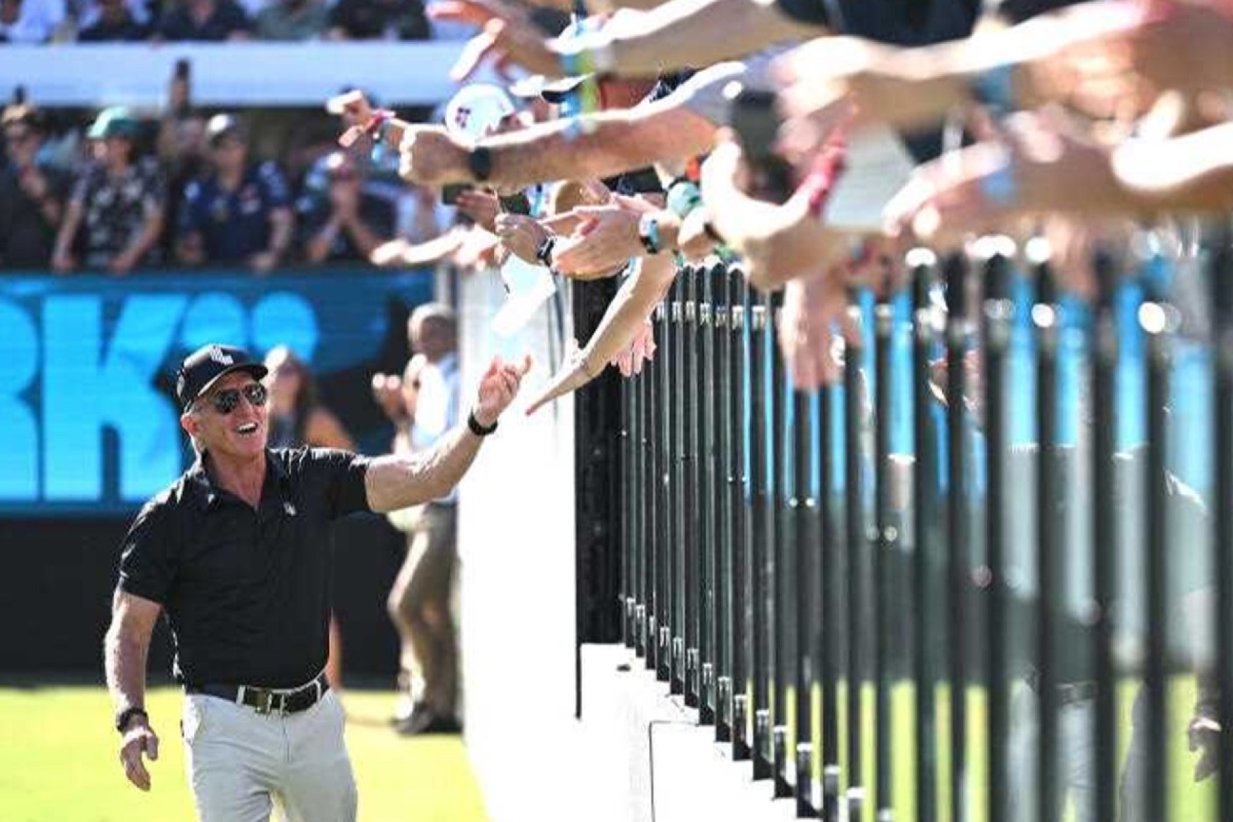 LIV Golf CEO Greg Norman reacts with spectators during the final round of LIV Golf Adelaide at the Grange Golf Club in April at last year's tournament. Photo: AAP Image/Michael Errey