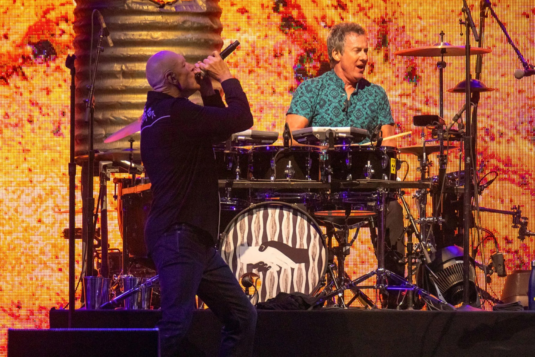 Peter Garrett, pictured here performing with Midnight Oil at WOMADelaide sunset concert series in 2021, is one of the musicians who told the ABC that Australia’s music scene is under threat. Photo: Tony Lewis