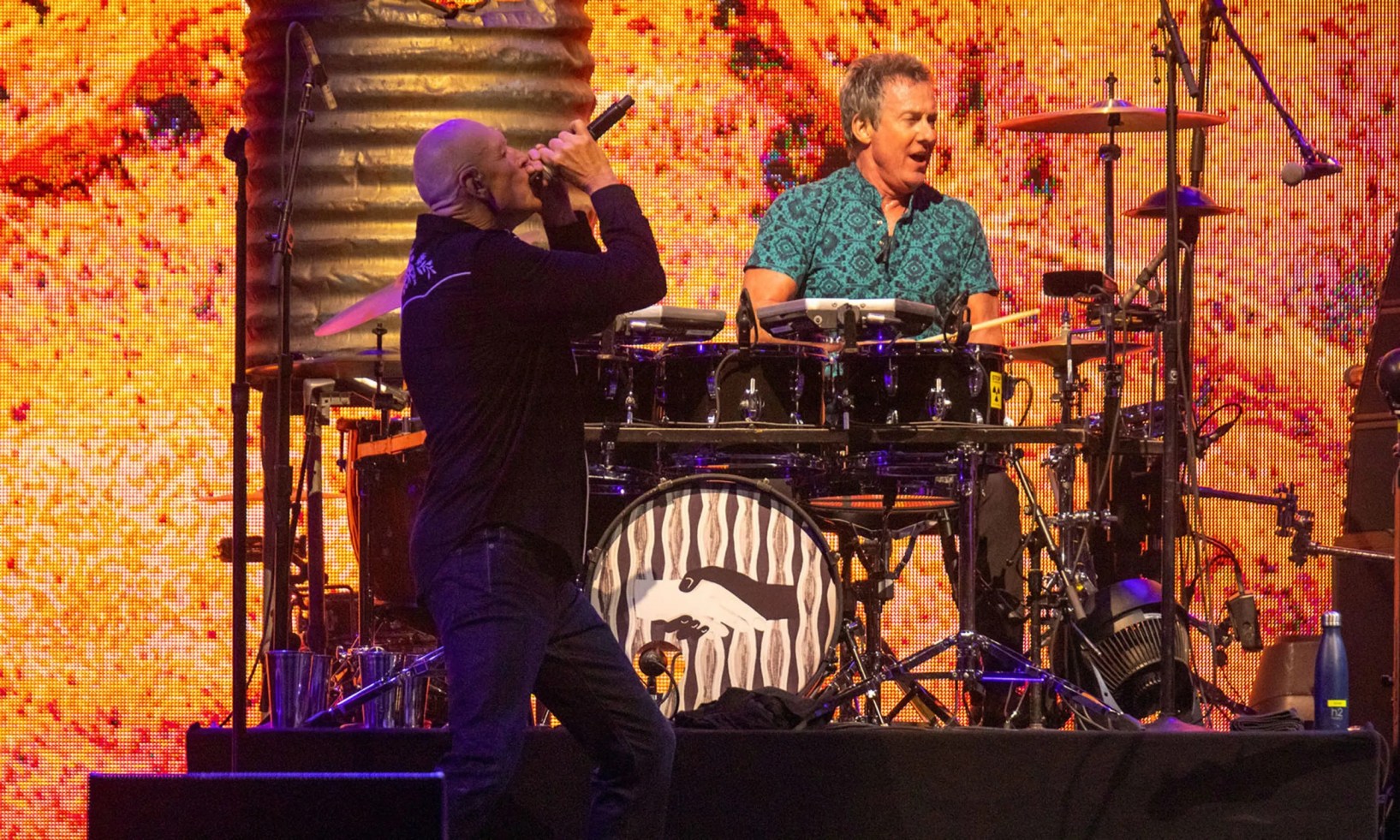 Peter Garrett, pictured here performing with Midnight Oil at WOMADelaide sunset concert series in 2021, is one of the musicians who told the ABC that Australia’s music scene is under threat. Photo: Tony Lewis