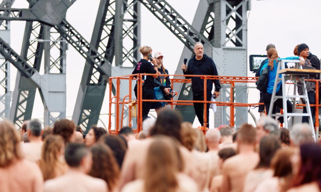 Thumbnail for Strip tease? Birthday suits only at Tunick’s latest global spectacle