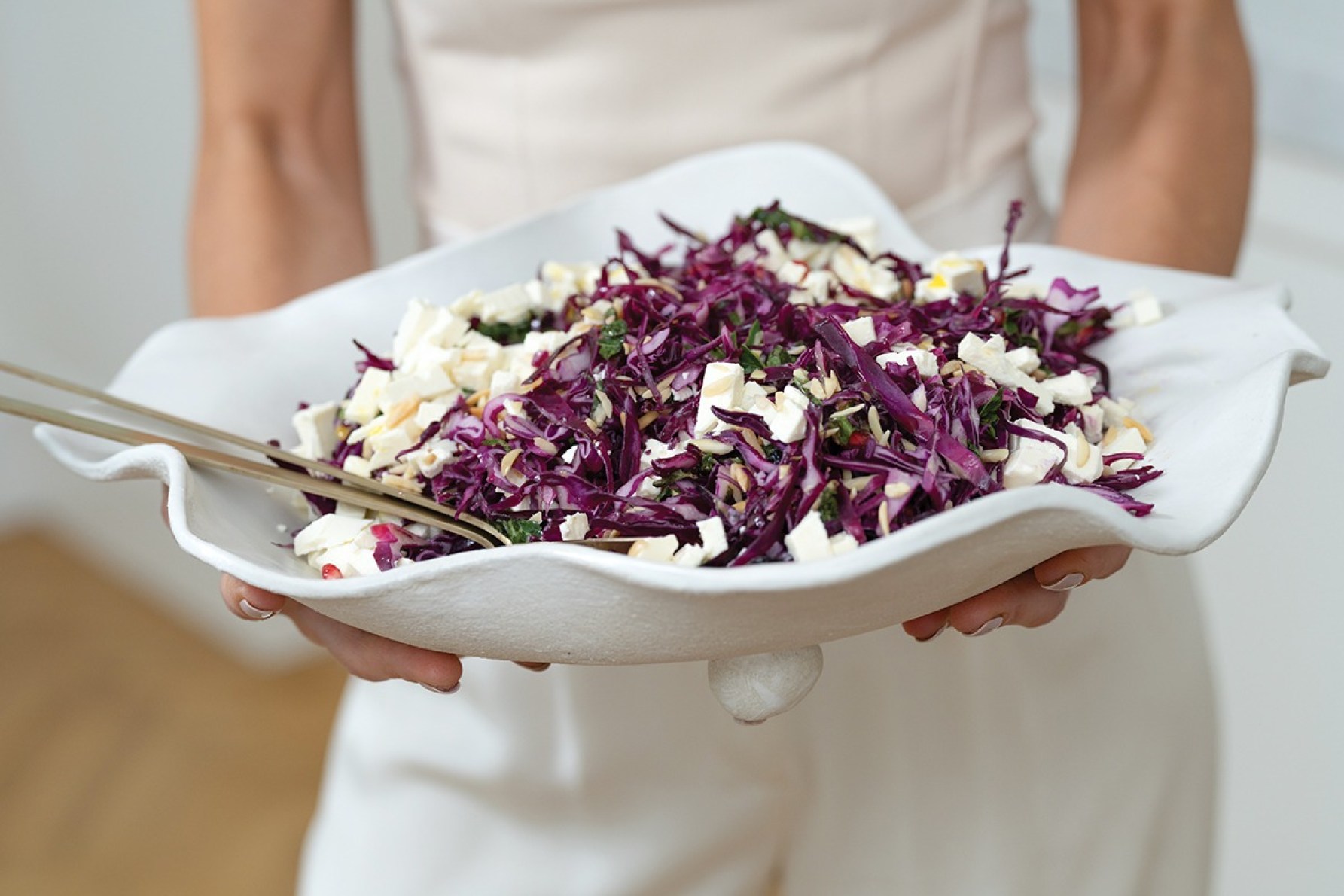 The red cabbage, mint and pomegranate salad with feta was served in pottery from Meg Michell.