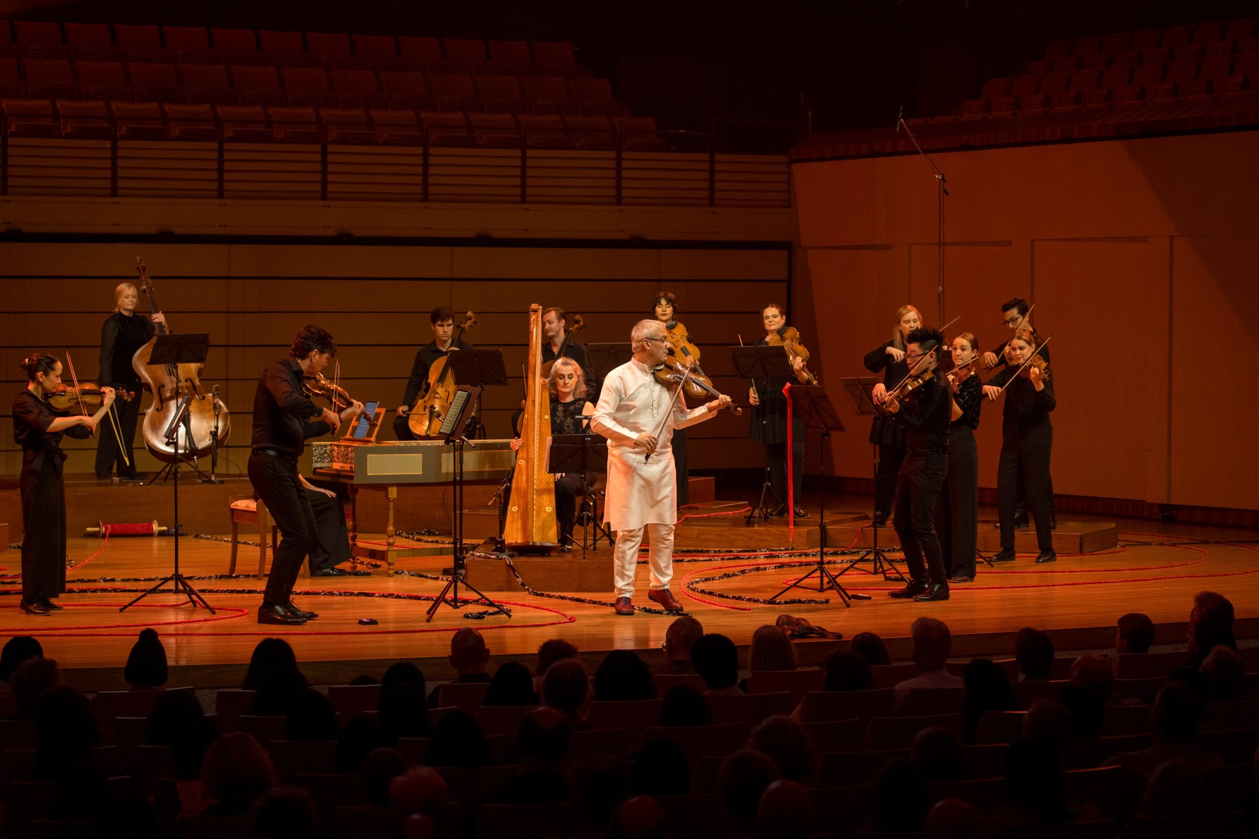 Baroque musicians  Davide Monti on violin and Maria Cleary on harp with Camerata  for Baroque Labyrinth in the Concert Hall at QPAC. Photo: Alex Jamieson