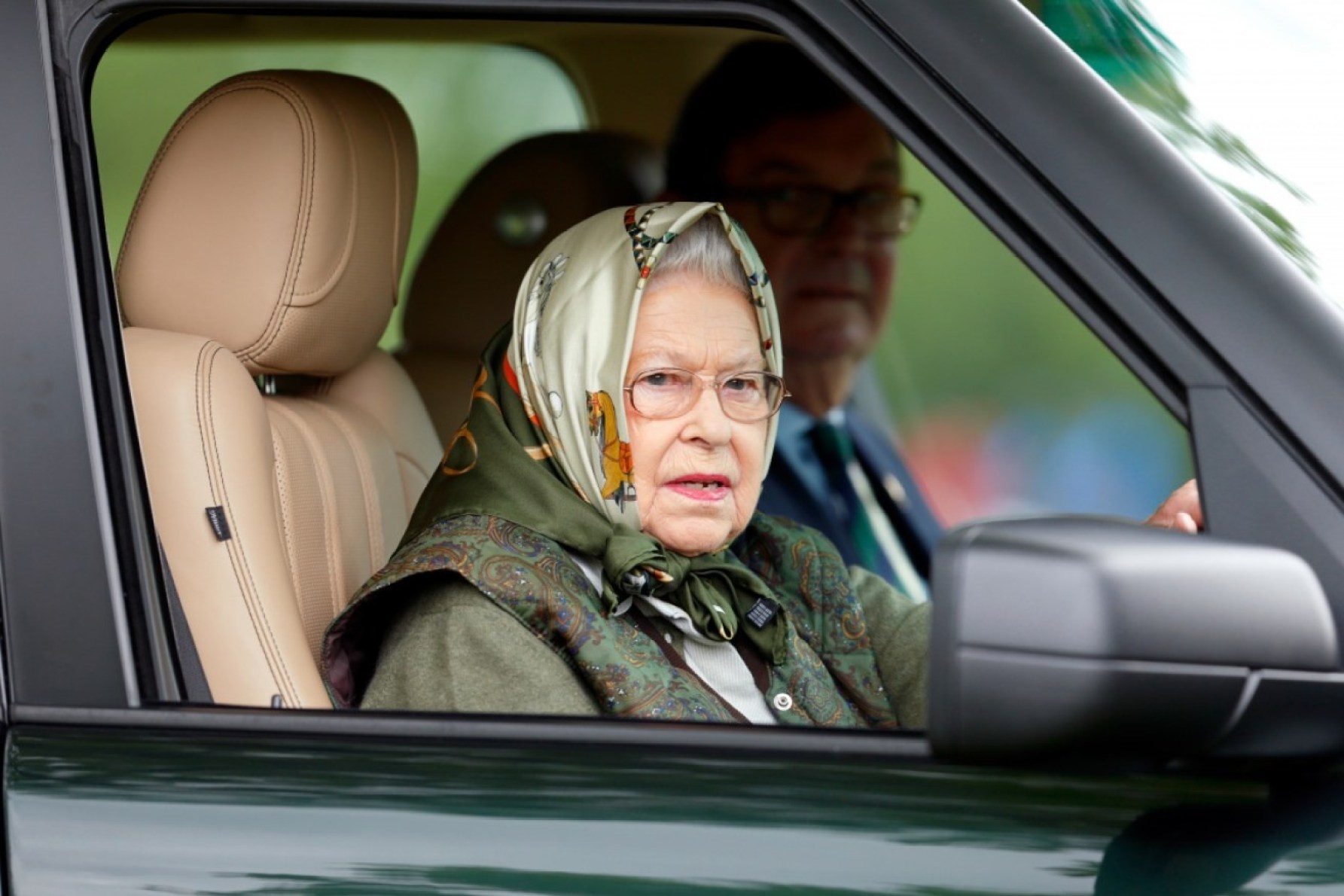 Even the Queen, wearing no seatbelt, could have benefited from a refresher course. Photo: Getty