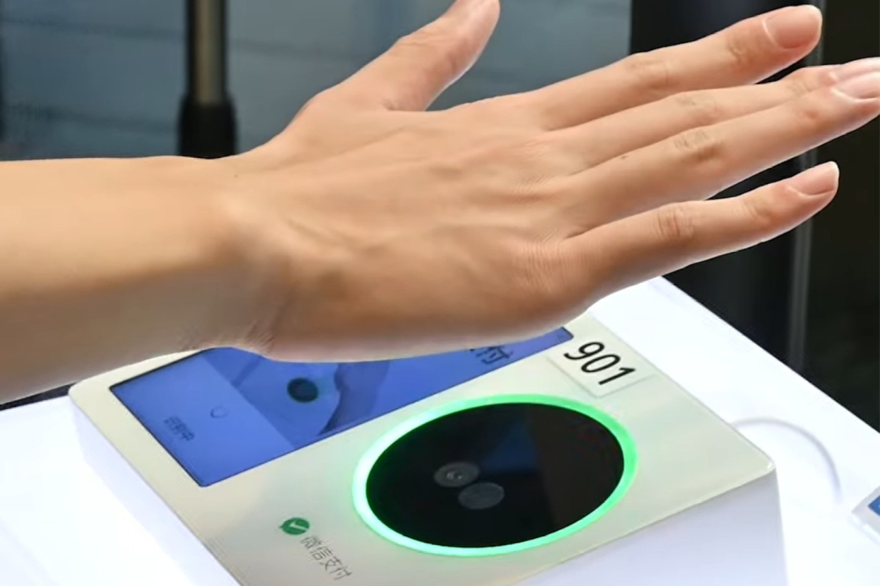 Paying by palm could be the way of the future. Photo: YouTube/Tencent Global

