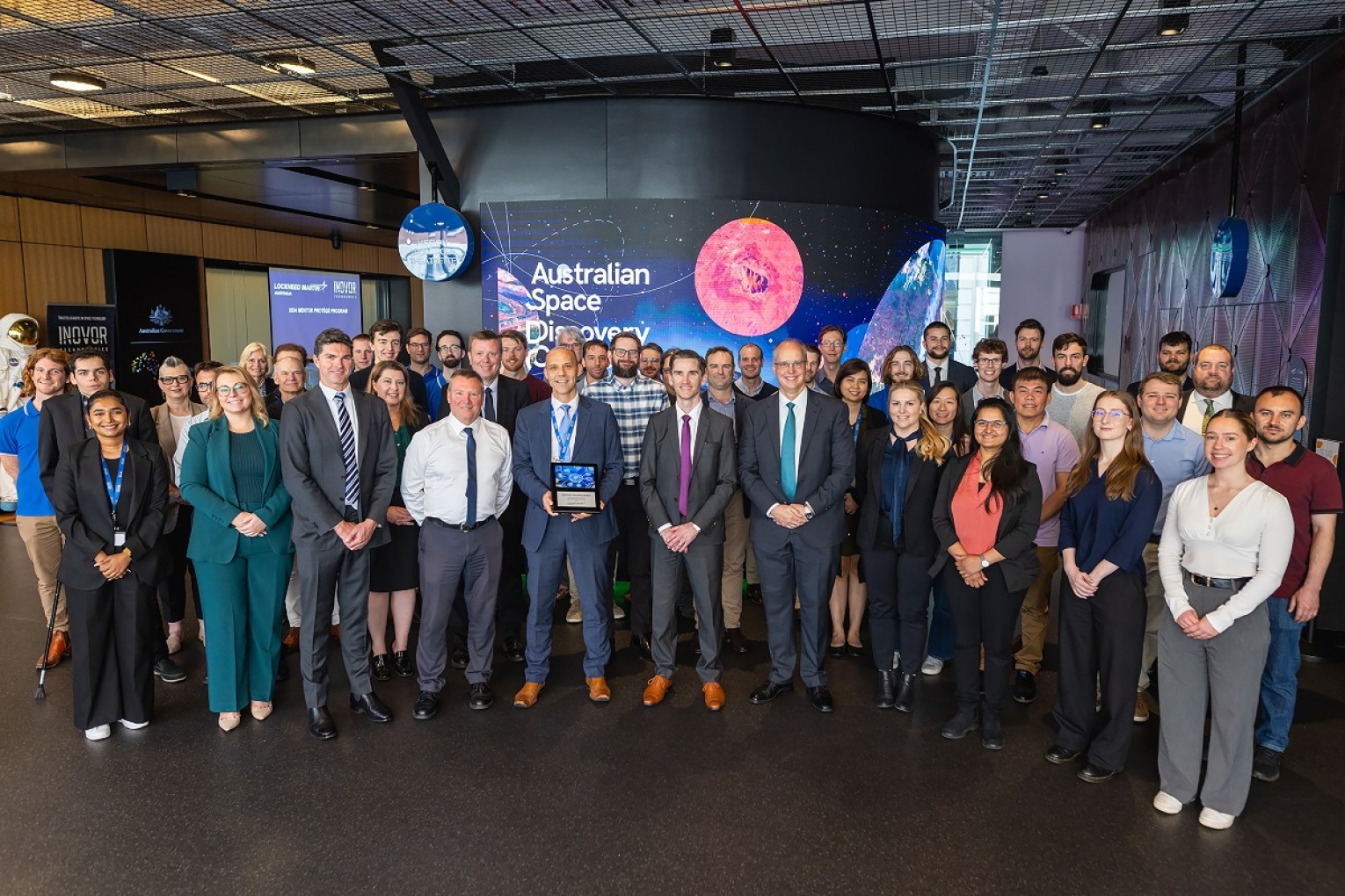 Inovor Technology's graduation ceremony in Adelaide included CEO and founder Matt Tetlow, COO Ben Adams, and Lockheed Martin Australia's regional director for Space David Ball. Photo: supplied