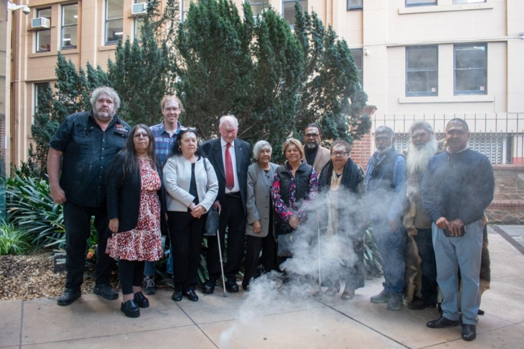 Kaurna elders gathered at Pilgrim Hall in the CBD for the launch of the Kaurna mapping project. (L–R) Corey Turner, Mitzi Nam, Isaiah Turner, Mearle Sampson, Lewis O'Brien, Yvonne Agius, Rosalind Coleman, Tim Agius, Lynette Crocker, Frank Wanganeen, Jeffrey Newchurch and Phillip Saunders. Photo: Helen Karakulak/InDaily