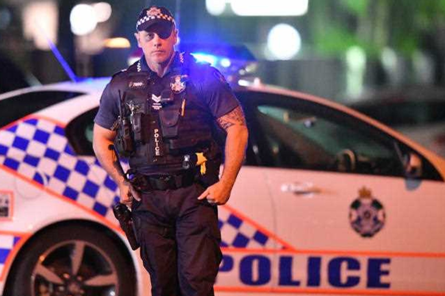 Police are checking for knives during Schoolies celebrations on the Gold Coast. Photo: Darren England/AAP