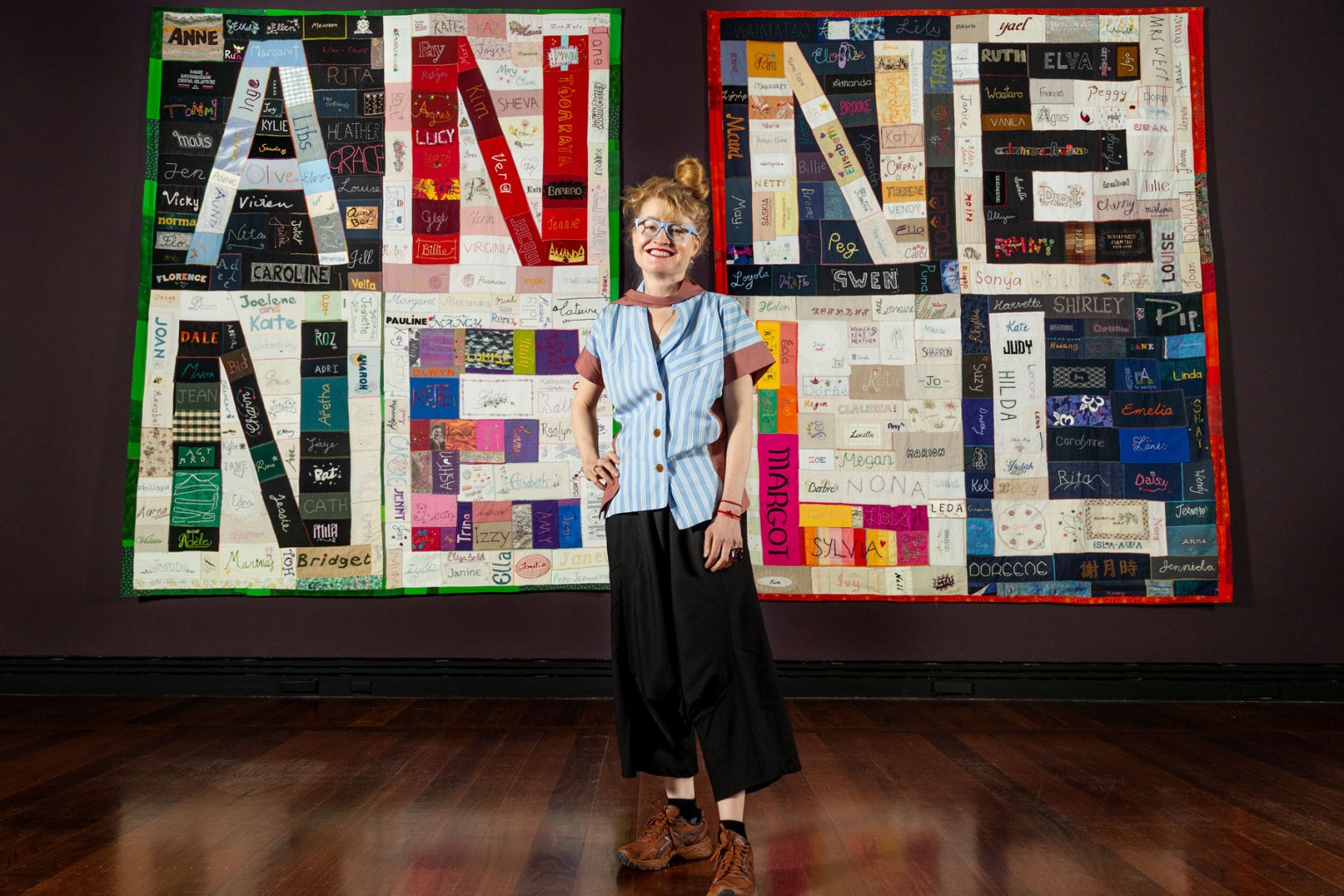 Nell with her work 'NELL ANNE QUILT' in the 'Radical Textiles' exhibition at the Art Gallery of South Australia, Adelaide. Photo: Saul Steed