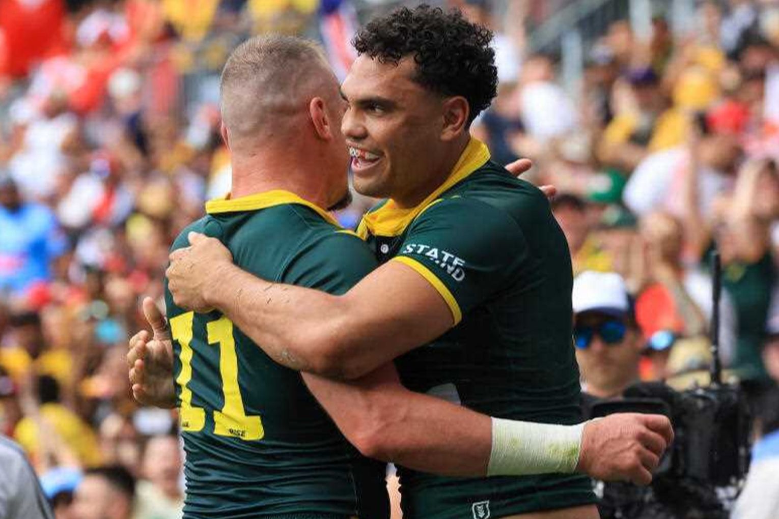 Speedster Xavier Coates (r) has been supported by his Kangaroos teammates after online abuse. Photo: Mark Evans/AAP
