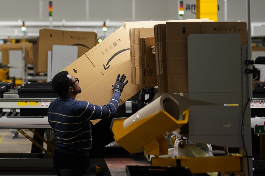 In Amazon's warehouses, workers' every move is monitored. Photo: AAP