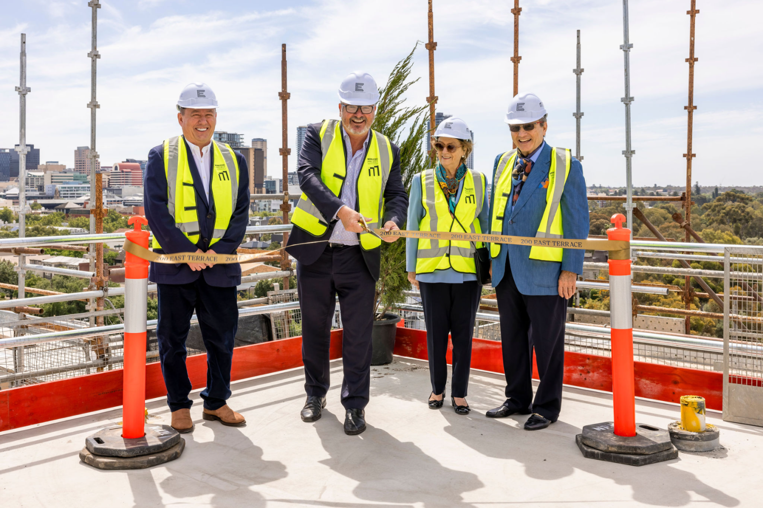 Garry Minuzzo, CEO of Minuzzo Project Management, Leon Bignell MP, Mrs Moll and
Mr Moll, Project Partners. Photo: supplied