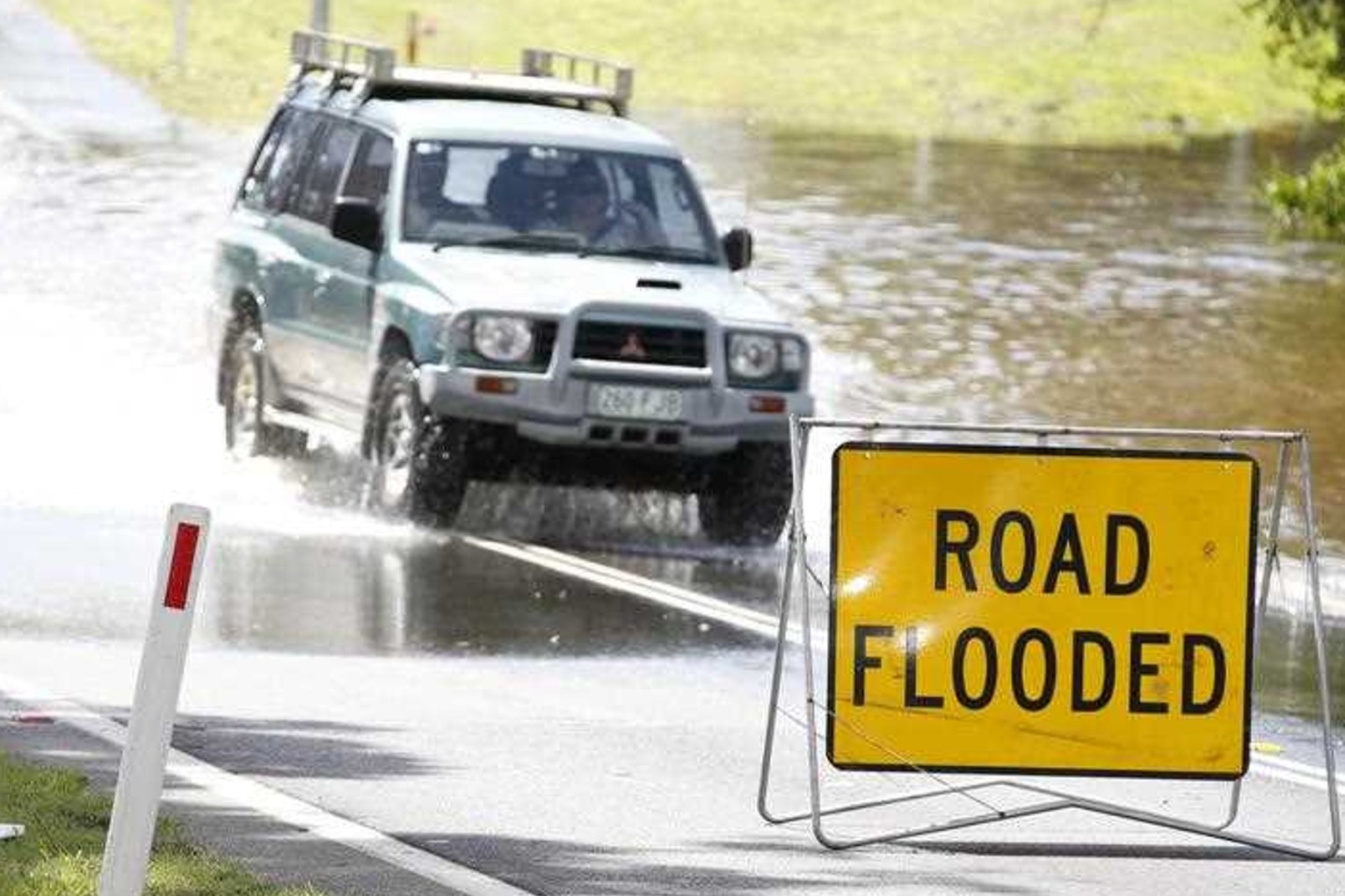 Queenslanders are being told to prepare for a possible dangerous summer of storms, floods and fires. Photo: Str/AAP