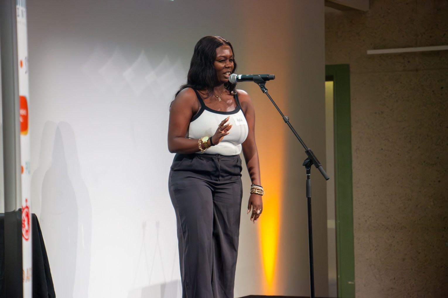 Slam poet Huda The Goddess performed at the Queensland Writers Centre's Christmas party as part of the Arts Queensland Poetry Awards presentations.