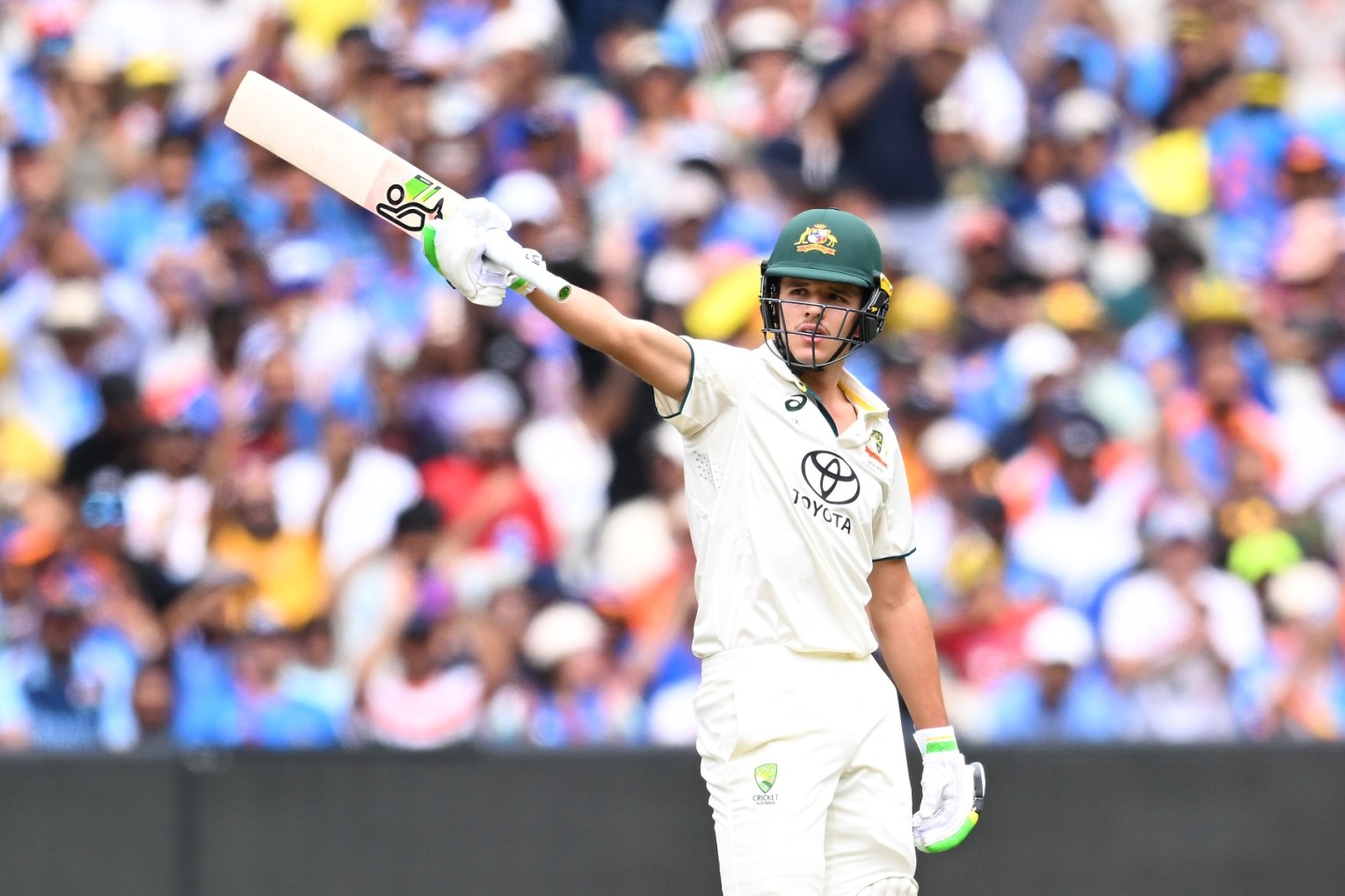 Sam Konstas celebrates his half century off just 52 balls on his Test debut at the MCG. Photo: AAP.