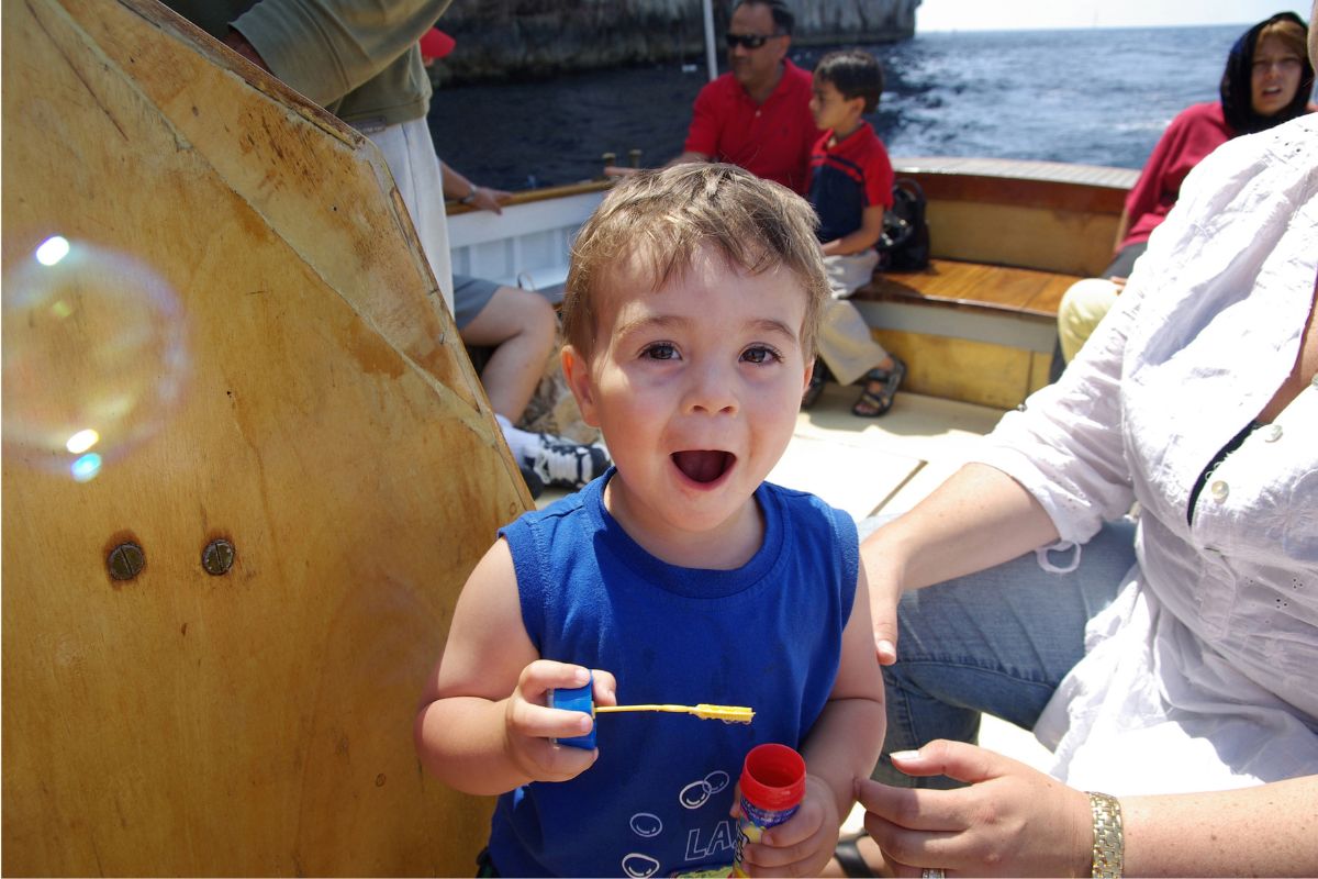 Marcus Callisto blowing bubbles on the Mediterranean by John Callisto. 