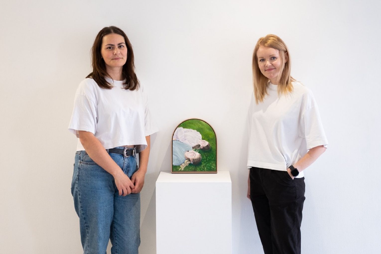  L—R: Jade Harland and Tiff Rysdale, next to the artwork 'Fire and Water' by Jade Harland.