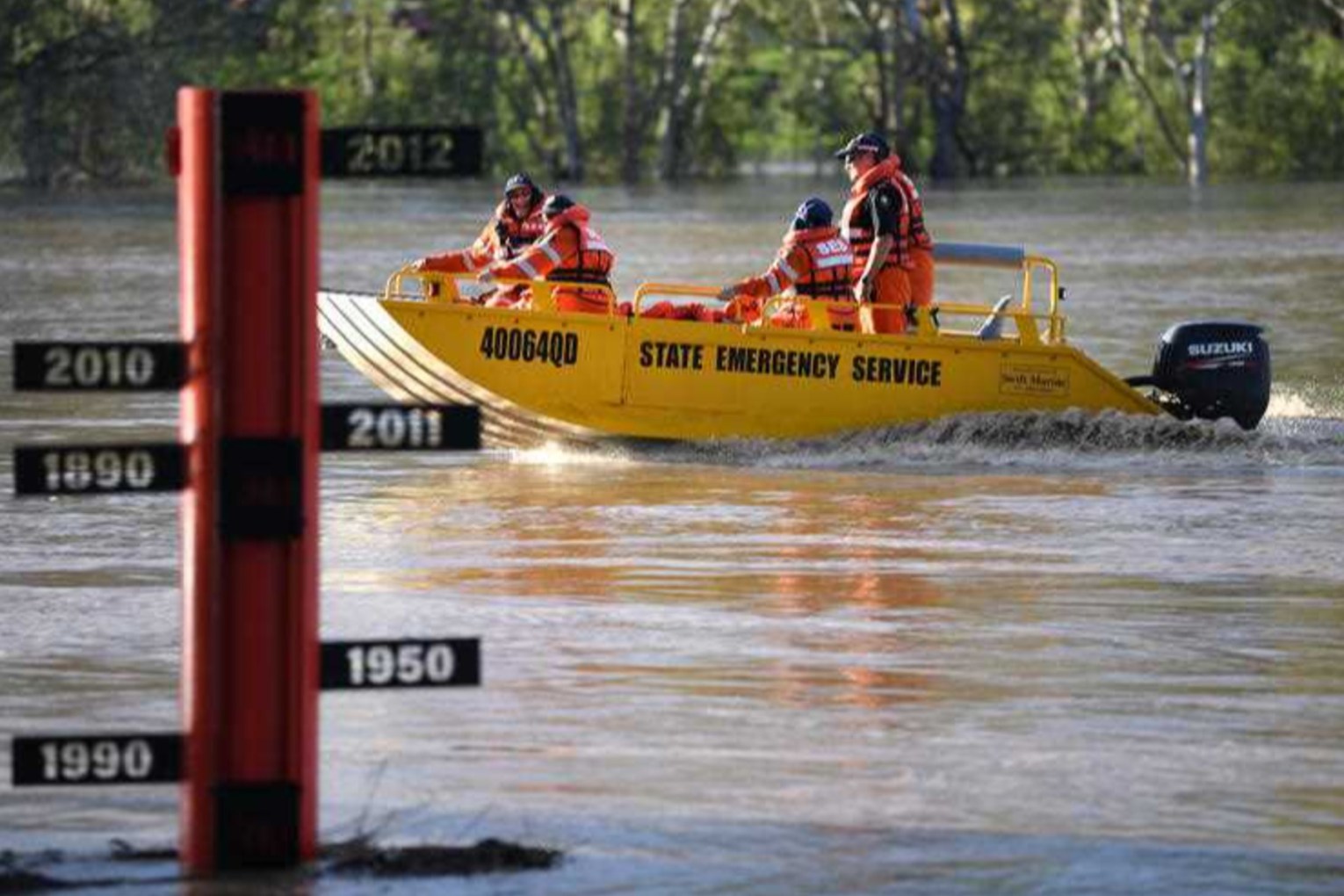 There have been almost 200 SES callouts across Queensland, including a flood rescue. Photo: Dan Peled/AAP