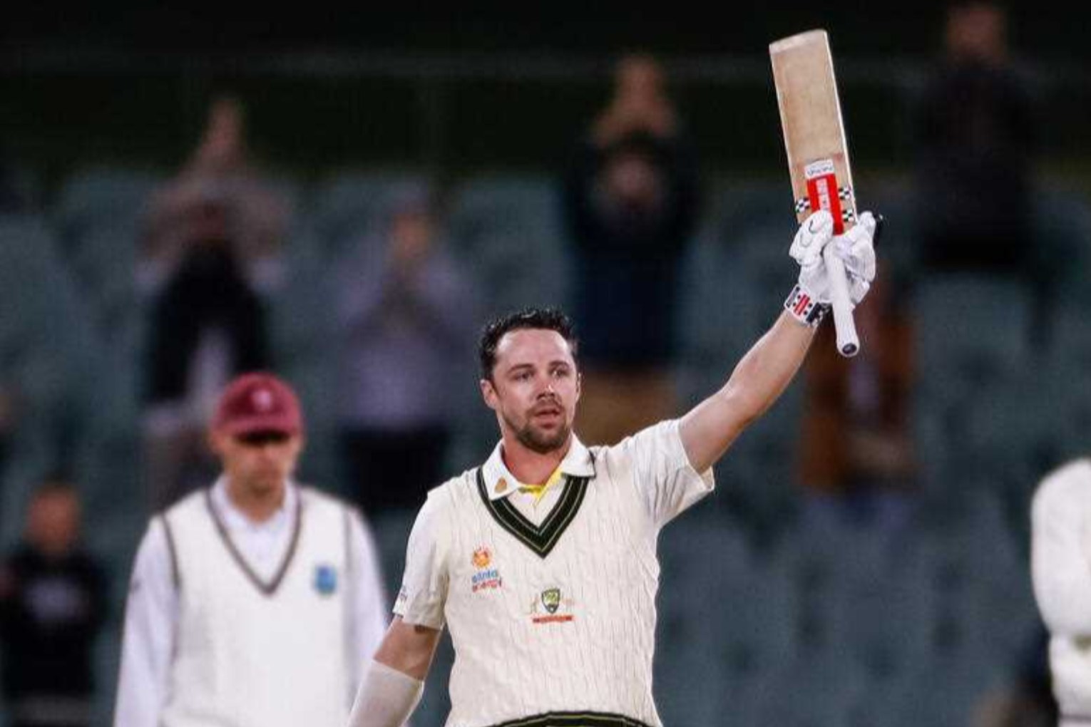 Travis Head salutes the Adelaide Oval crowd after scoring a day-night Test century in 2022. Photo: Matt Turner/AAP