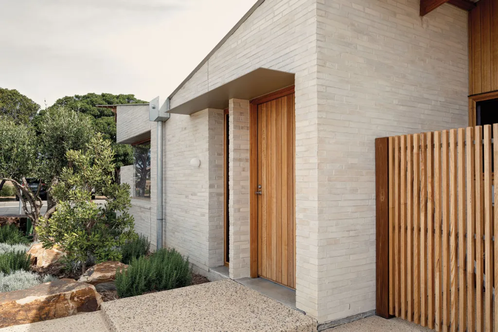 Natural colours and materials greet you immediately, from the beautiful Krause bricks, to the towering timber door.