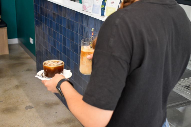 Thumbnail for Cafes, small businesses fear brunt of surcharge cut