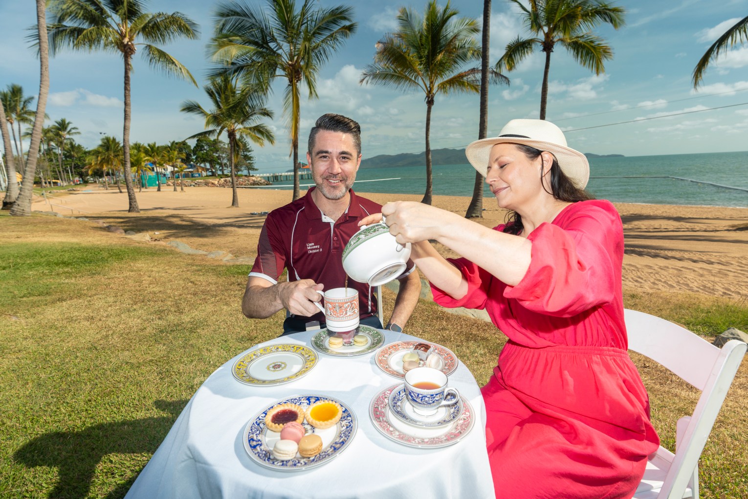 Tea for two: councillor Liam Mooney and Townsville City Galleries director Holly Arden enjoy a cup of tea on The Strand to celebrate the Wedgwood: Artists and Industry exhibition coming to Townsville