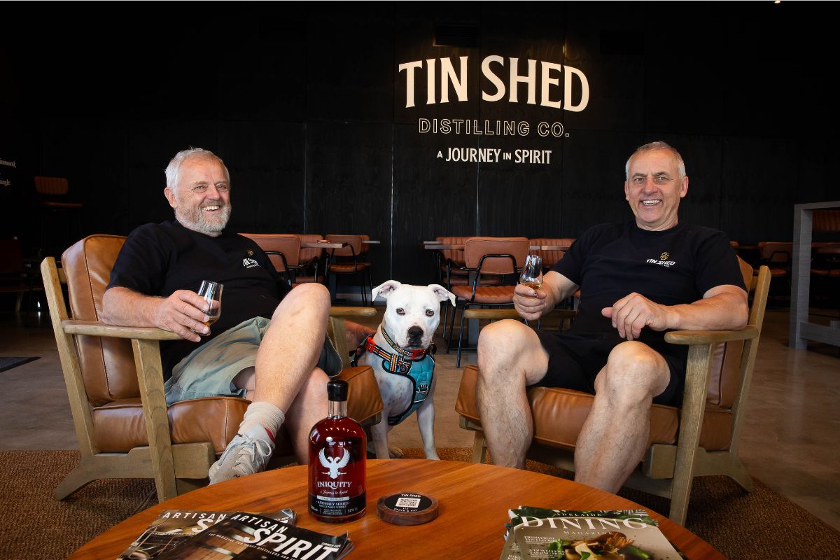 Tin Shed co-founders (L–R) Ian Schmidt and Vic Orlow's new spot features a barrel room, tastings, live music and smokehouse BBQ dining. 