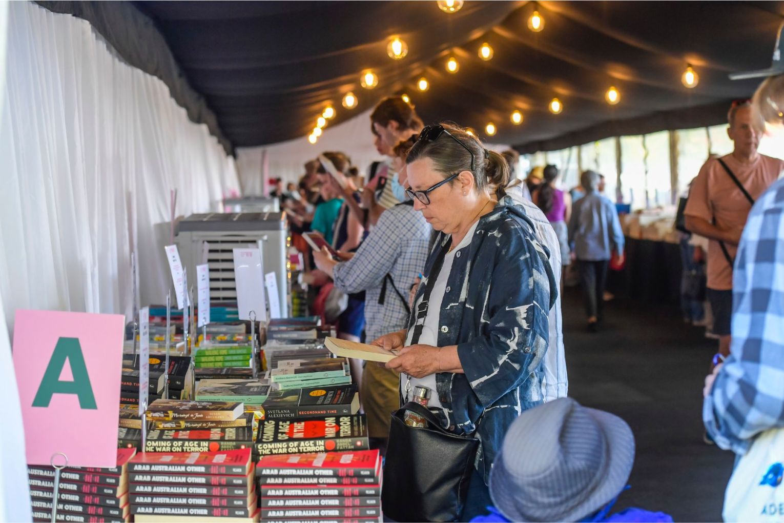 Dillon's Bookshop partners with Writers' Week to operate the book tent. Photo: Roy VanDerVegt.