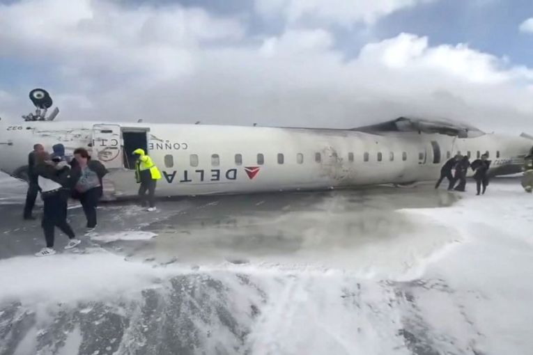 Thumbnail for 15 injured after plane flips on landing