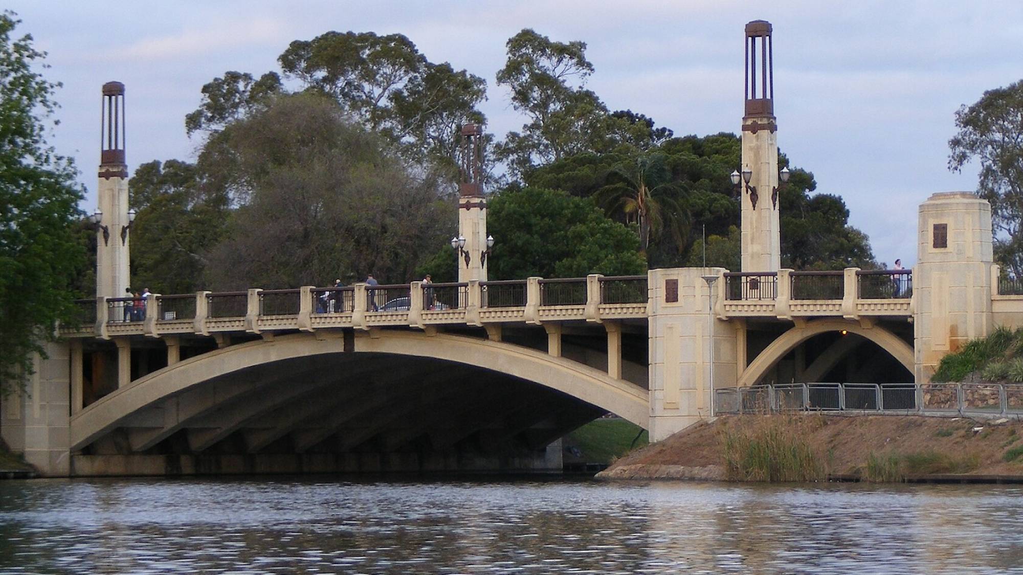 Poem: I am sitting on the edge of a bridge