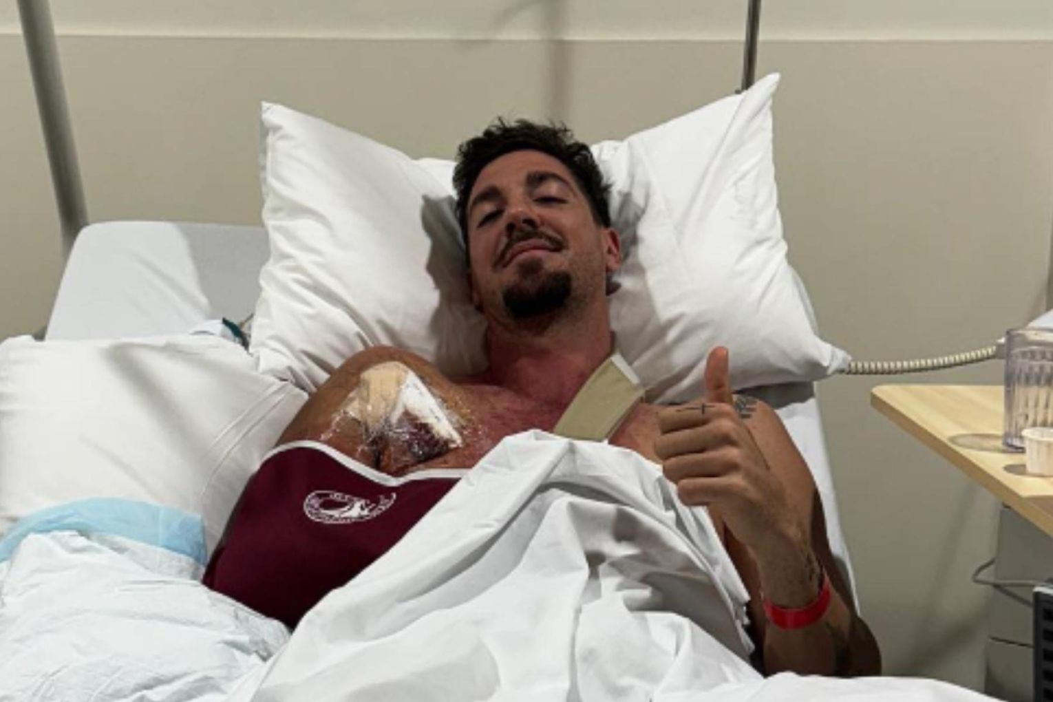 Thanasi Kokkinakis shared a post of himself in hospital following an operation to correct an ongoing pectoral injury. Image: Instagram