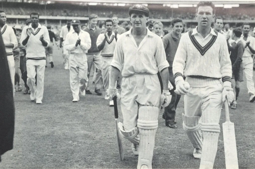 Les Favell and Bob Simpson after a test match against the West Indies. Photo via Favell's autobiography 'By Hook or by Cut'.