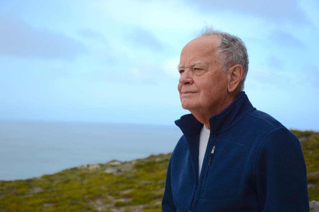 Architect Max Pritchard looks out to the great expanse of ocean outside the Southern Ocean Lodge. Photograph Zoe Rice