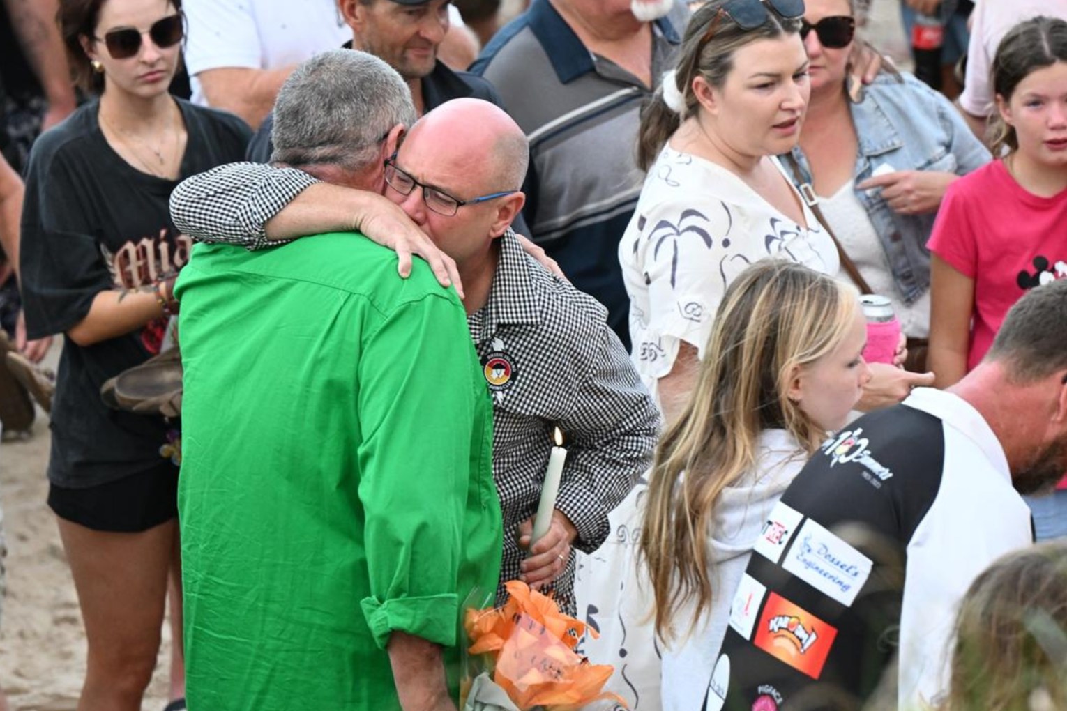 Charlize's Zmuda's father Steven was joined by thousands of people for a vigil in her honour. Photo: Darren England/AAP