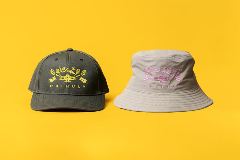 Bucket hat and cap souvenir from Chihuly in the Botanic Garden - on a yellow background
