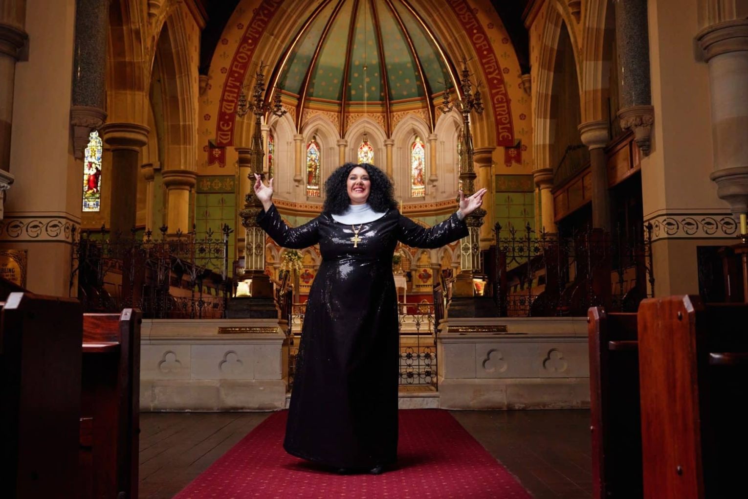 Casey Donovan performs the role made famous by Whoopi Goldberg in Sister Act. Photo: Benny Capp / Supplied