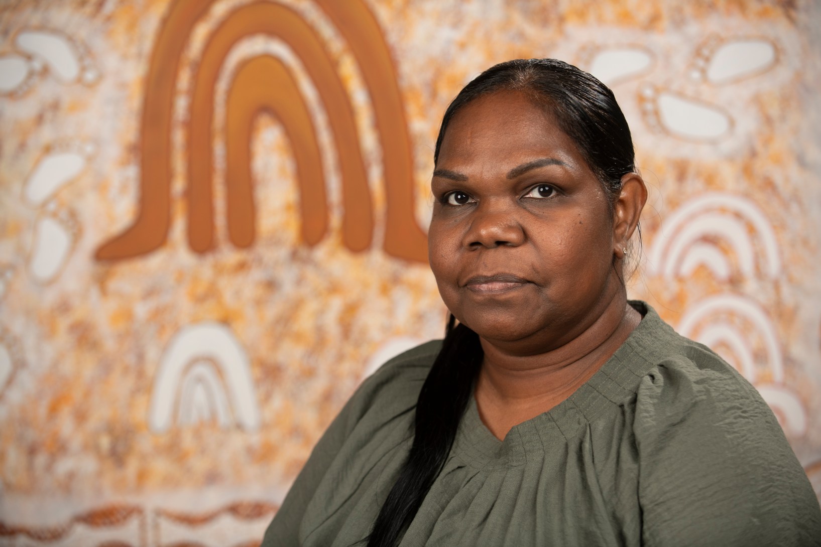 The art and personal story of artist Colleen Sam and her family tells the story of the Kalkadoon people and their struggle to retain their culture.