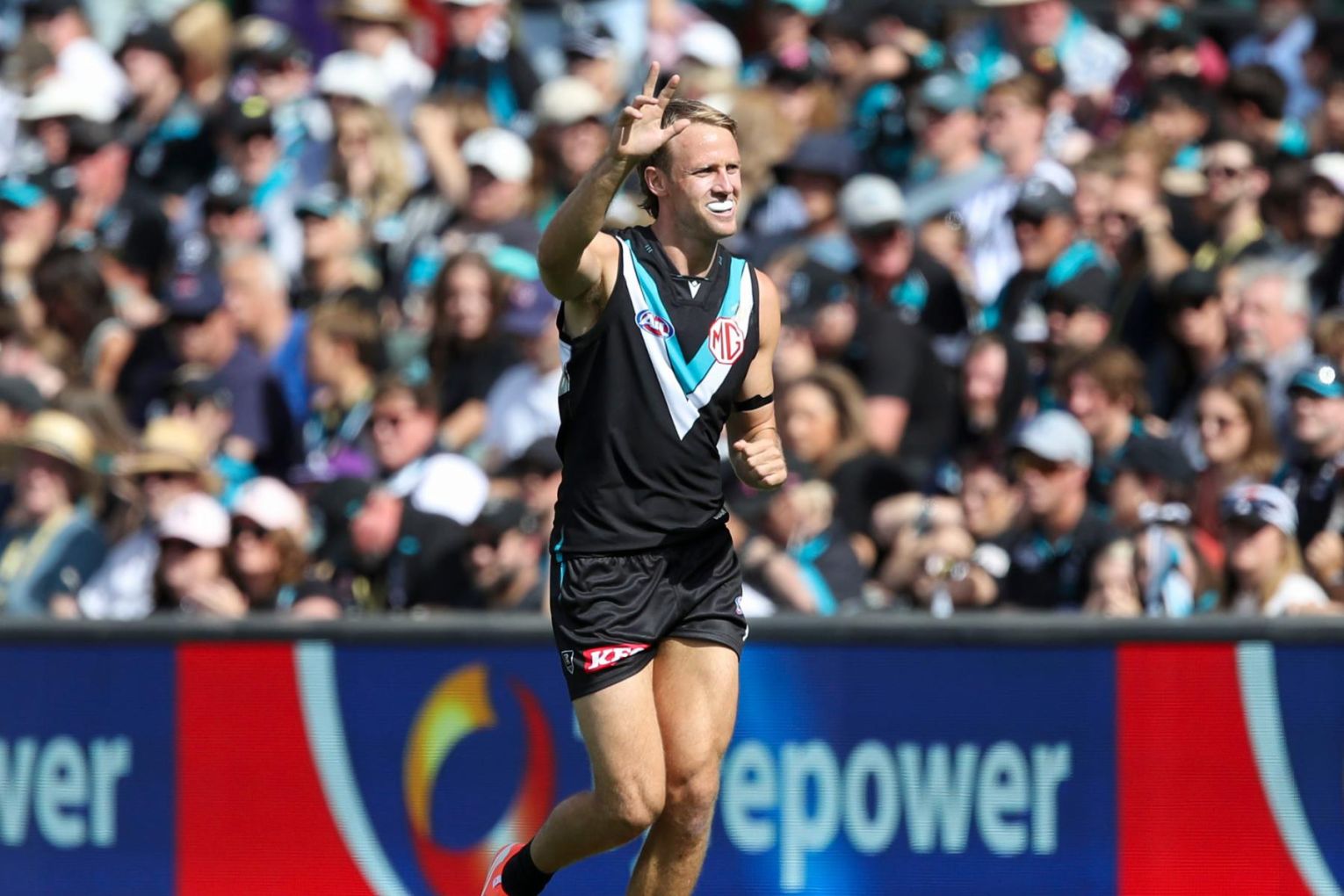 Recruit Jack Lukosius was injured in his first home game for Port Adelaide on Saturday. Image: Matt Turner/AAP