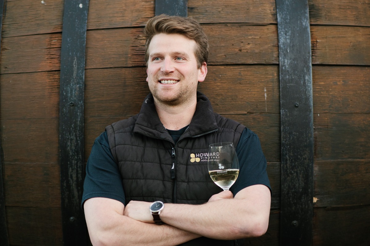 Tom Northcott of Howard Vineyard holding a glass of his wine. Cleaned water is being used at his property in the Adelaide Hills