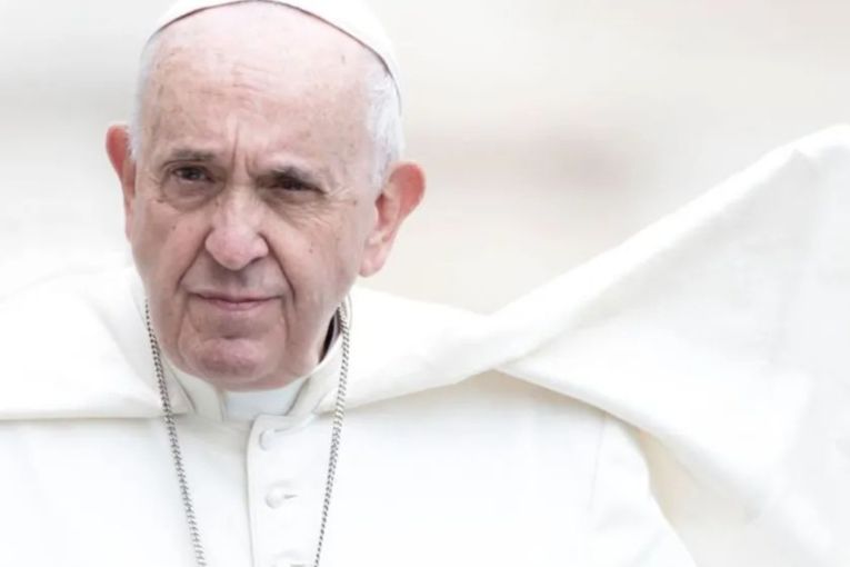 Thumbnail for Vatican shares first photos of late Pope in coffin