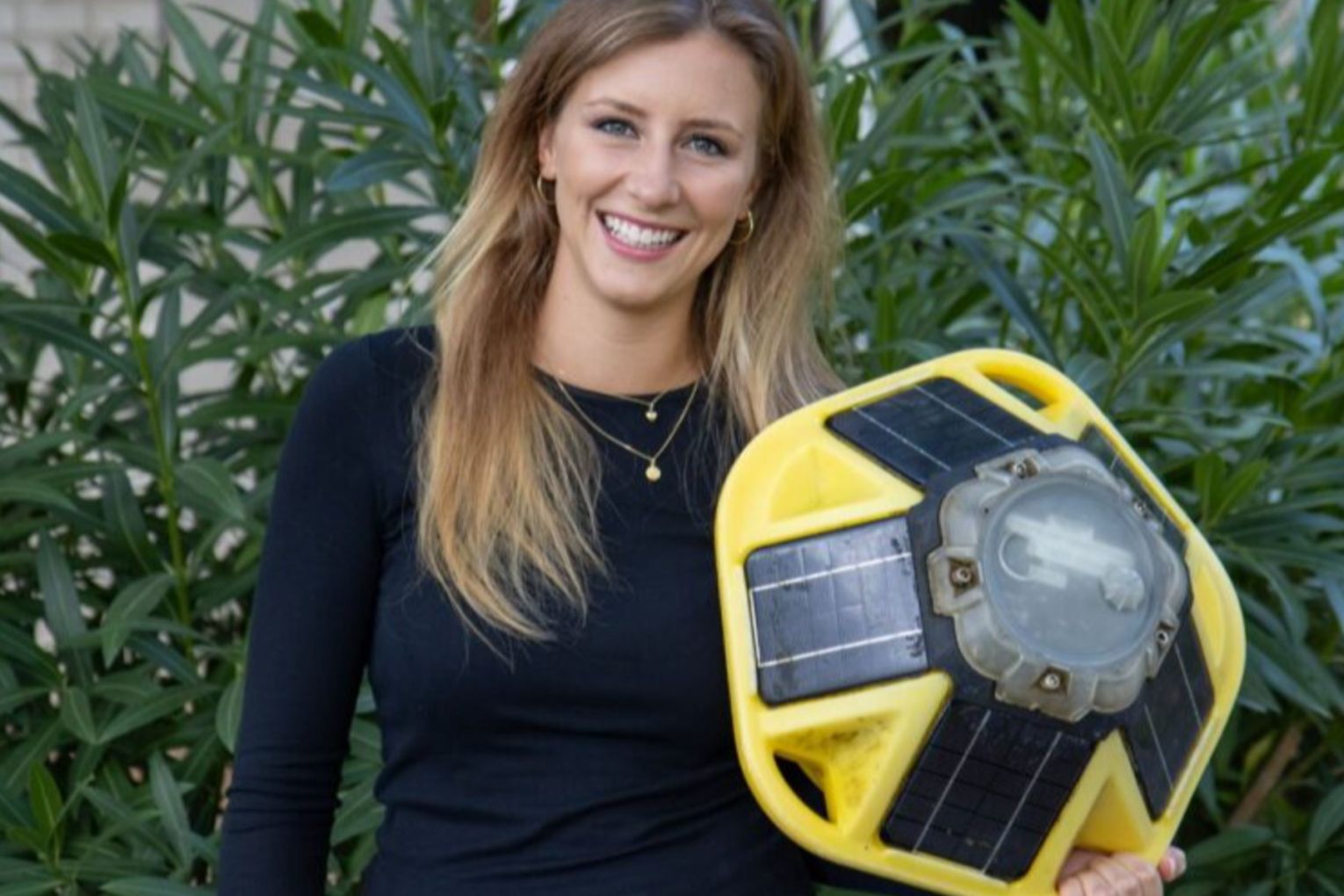 PhD student Charlotte Uphues with one of the Sofar Spotter metocean buoys. Photo: supplied