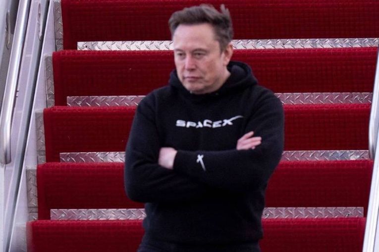 Thumbnail for Musk to spend more time with Tesla as profits dive