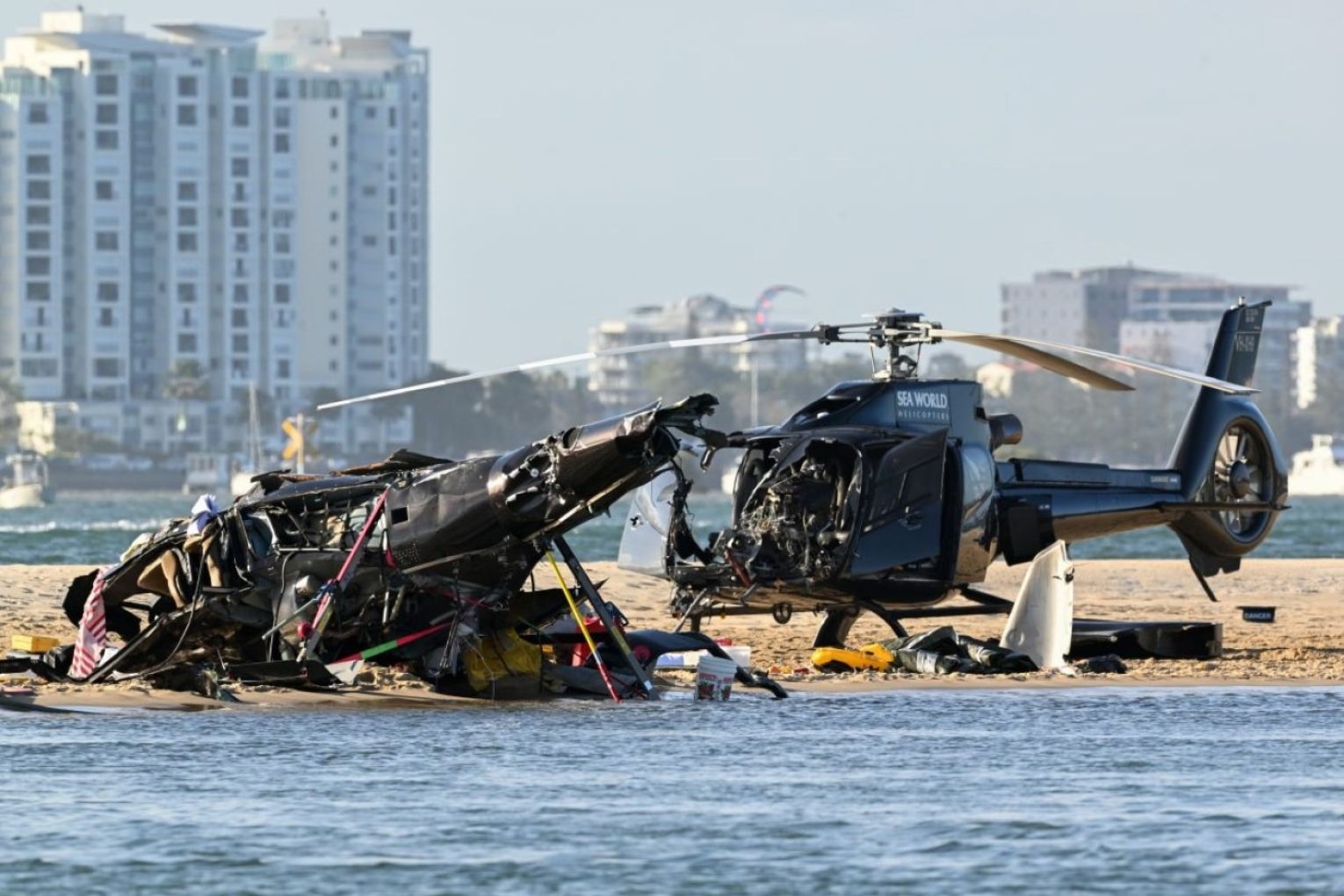 Four tourists died when two helicopters collided near a popular marine theme park. Photo: Dave Hunt/AAP 